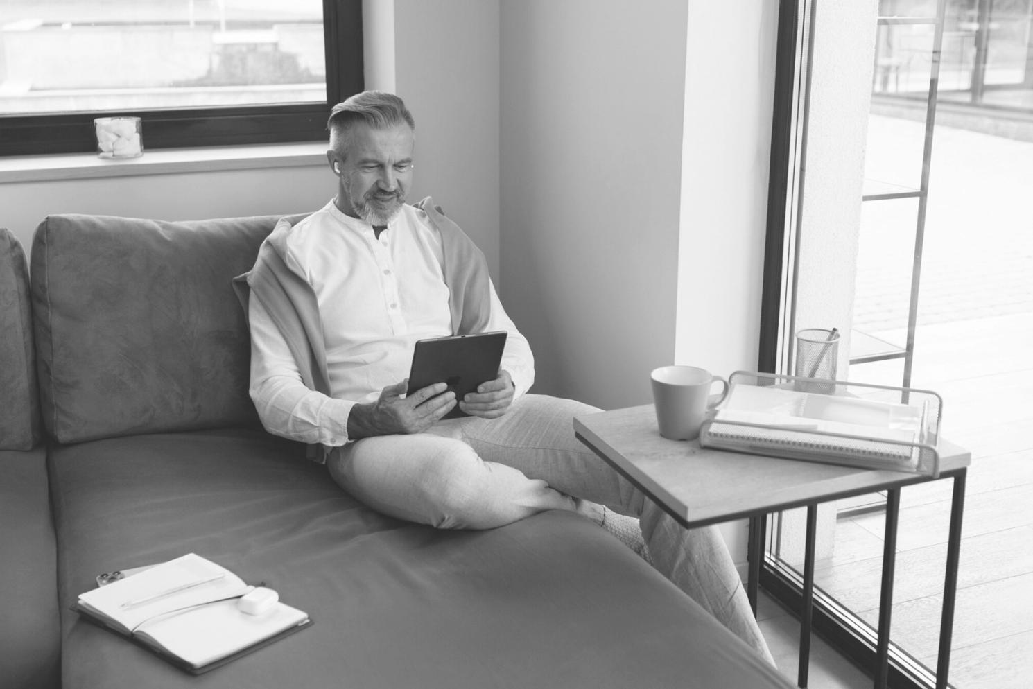 Testing team reviewing software functionality on various devices and screen sizes