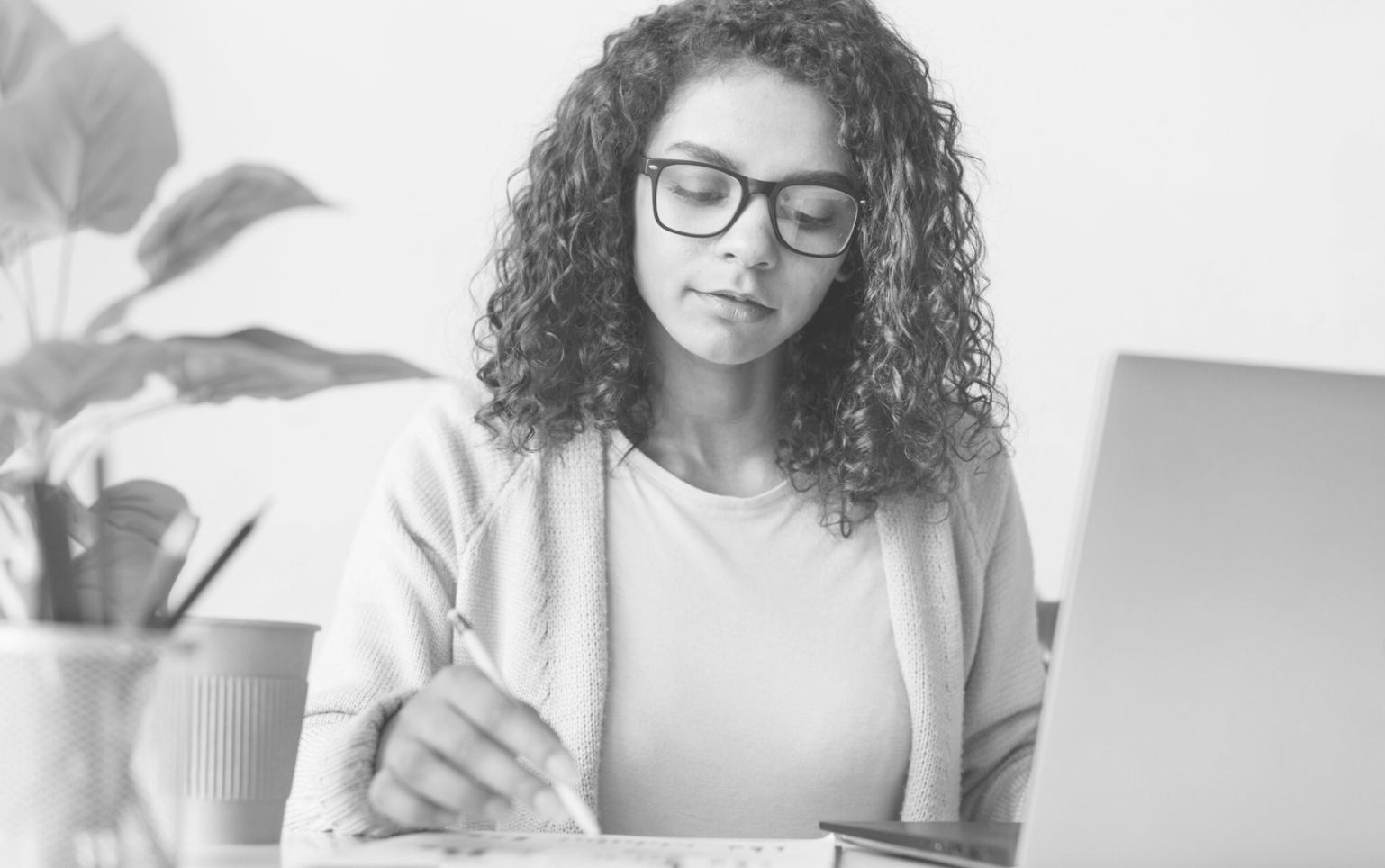 Professional software testing workspace with multiple monitors displaying test scenarios