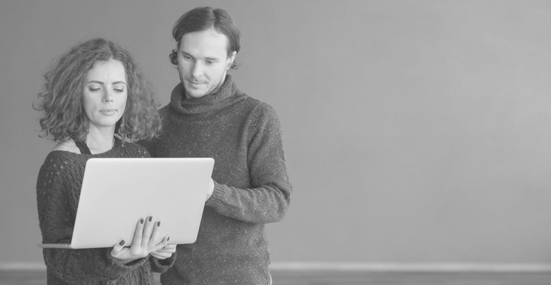 Software quality assurance team reviewing test results and validation procedures