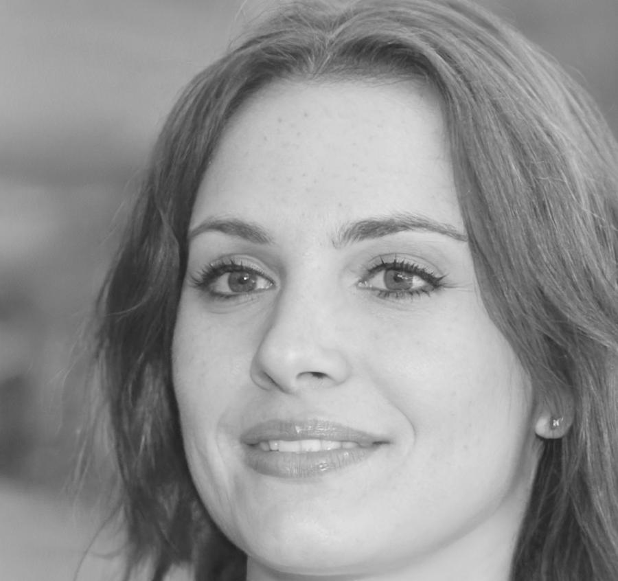 Professional headshot of validation expert instructor